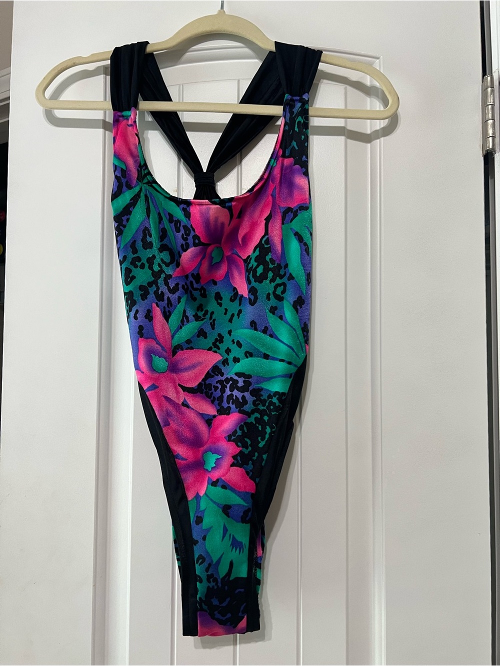 Vintage 80/90’s XL one piece swimsuit with a bright floral and cheetah pattern